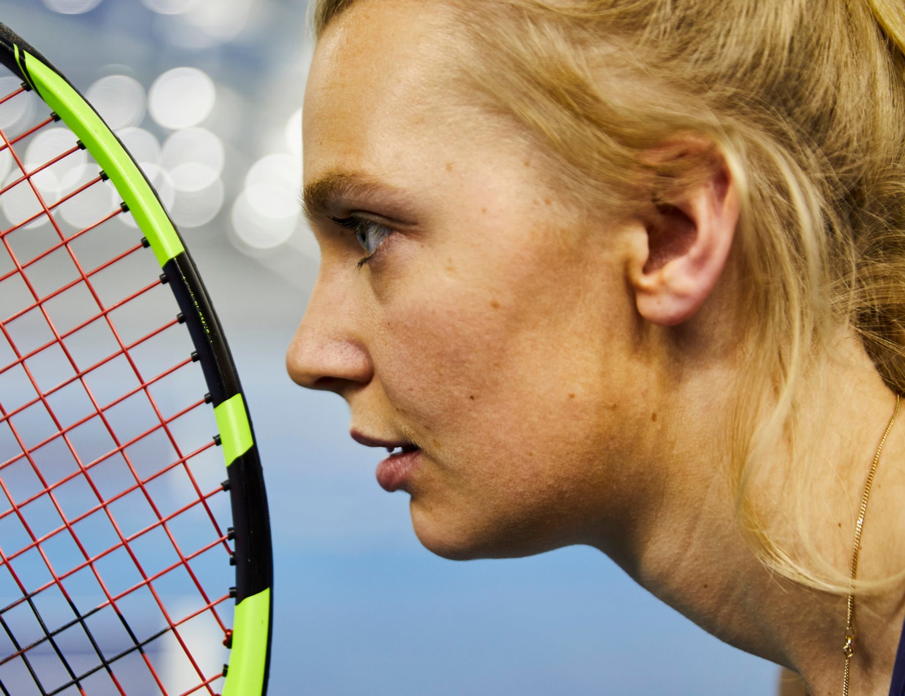 Woman holding tennis raquet